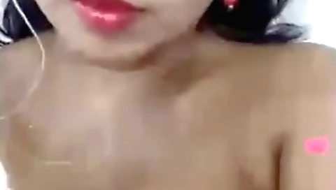 Amateur brunette girl is doing her favorite tango video