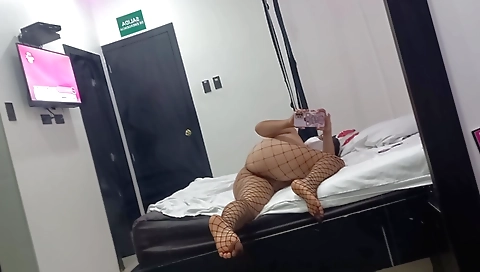 Sexy brunette in a big ass and sexy body is alone in the club