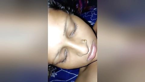 Indian brunette rides black cock in the missionary position