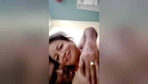 Indian milf is giving a blowjob to her stepbrother