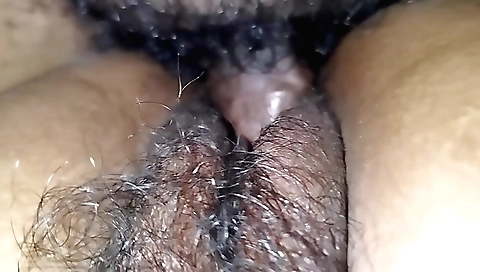 Indian girl with hairy pussy fucks in the amateur film
