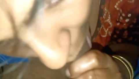 Indian wife enjoys oral sex on her husband's couch