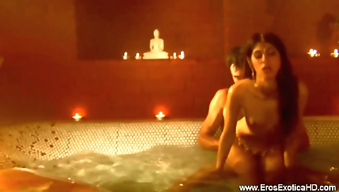 Sexy brunette milf is playing with a dildo in her ass