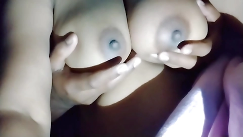 Busty indian with huge boobs is in the pose of erotic massage