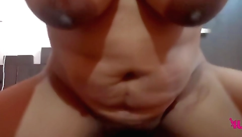 Indian brunette with big tits shows her big ass in this vid