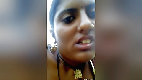 Indian girl in a dress shows her big tits in public outdoors