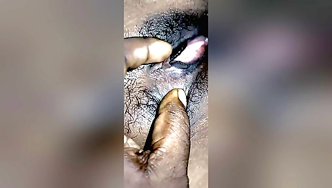 Busty amateur slut with hairy pussy sucking on her cock