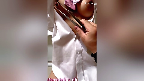 Training her tits with a big dildo and a baggy shirt
