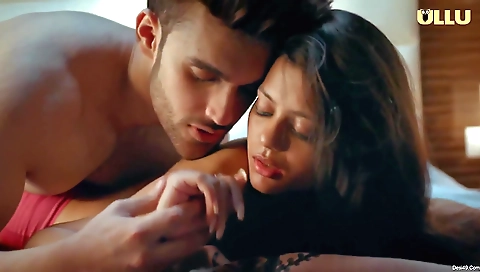 A brunette babe with a perfect body and a sexy face is with a guy