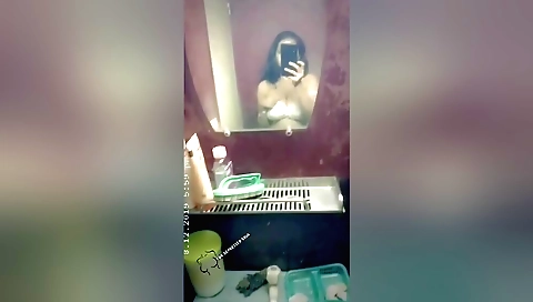 Indian amateur brunette shows off her big boobs and tits