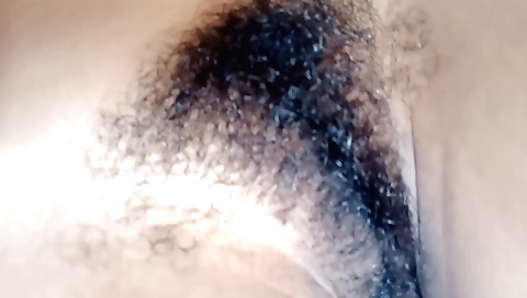 Hairy indian chick has her pussy fucked by herself