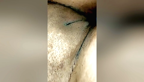 Indian girl with curly hair and a nice natural face is cleaned