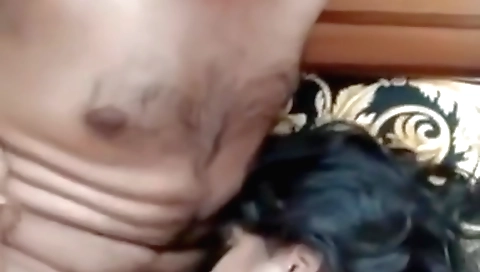 Busty indian babe gives a blowjob to a handsome man