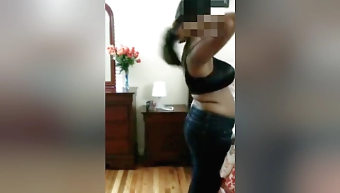 Busty indian hottie in a black dress gets herself wet