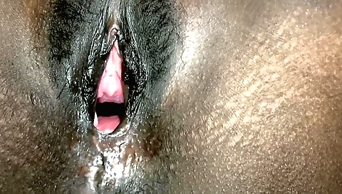 Indian amateur porn video with a white dick in her mouth