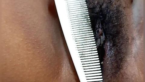 Indian babe is naked on a couch and showing her hairy pussy