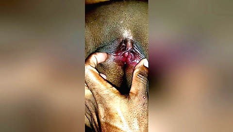 Indian wife is masturbating her pussy on the couch