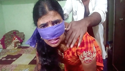 Indian brunette in a dress is having a hard-on with a cock
