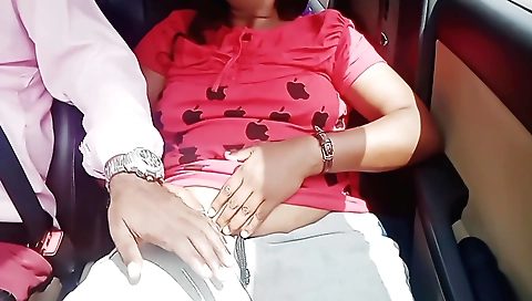 Indian brunette rides her partner's car and sucks his cock