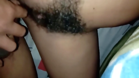 Amateur hairy girl 18+ is fucking in her tight cunt