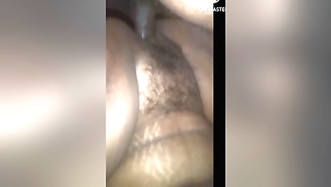 Busty Indian woman in a bikini enjoys her hairy body